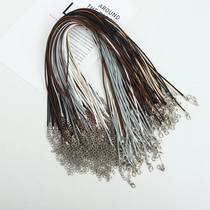 Detail of leather cord necklaces with metal lobster clasps and extension chains in bulk