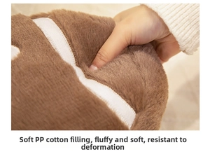 Close-up of brown plush toy with soft PP cotton filling and high elastic rebound