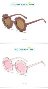 Side view of flower-shaped kids sunglasses in matte dusty pink and glittery light pink