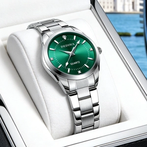 Elegant silver quartz watch with green dial and diamond markers in a gift box