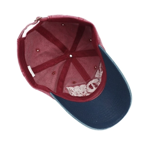 Distressed washed cotton baseball cap in burgundy and navy blue with adjustable metal buckle