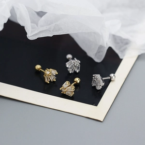 Detailed close-up of S925 silver stud earrings with baguette zircon and screw back