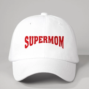 Close-up of white cotton baseball cap featuring red Supermom printed text on front