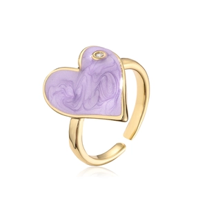 Detail of 18K gold heart ring featuring purple enamel marble texture and zircon