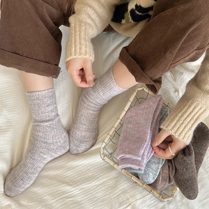 Thick wool blend mid-calf socks for women featuring warm gradient rib-knit texture