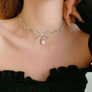 Elegant bow tie pearl pendant necklace with sparkling rhinestones for women jewelry