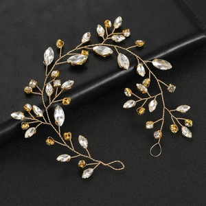 Handmade bridal hair vine with sparkling crystals and gold wire for wedding hairstyles
