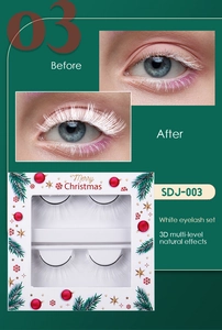Detailed comparison of 3D layered white false eyelashes with festive Christmas packaging