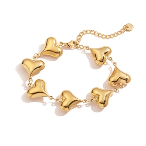 18K gold plated stainless steel bracelet with multiple heart charms and lobster clasp
