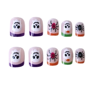 Halloween press-on nails featuring skull and spider patterns in macaron colors