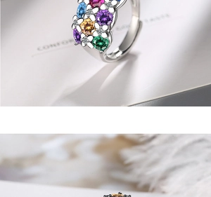 Macro shot of colorful cubic zirconia stones and flower design on adjustable ring