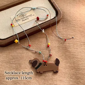 Detailed view of a 115cm dachshund pendant necklace with colorful acrylic beads
