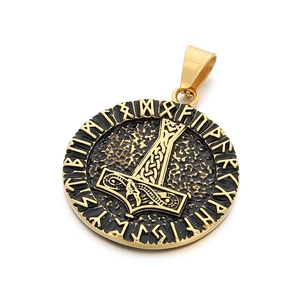 Golden Viking Mjolnir pendant with Nordic runes on black background, stainless steel