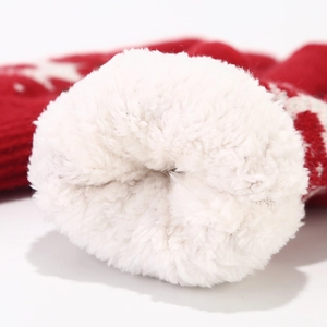 Winter knit gloves with warm white fleece lining and red snowflake pattern