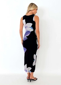 Detail view of the back of a slim fit sleeveless black floral maxi dress for women