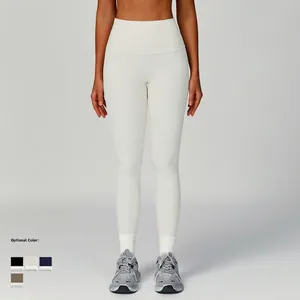 White high-waisted ribbed yoga leggings with tummy control for athletic fitness training