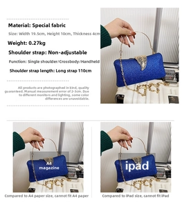Detail view of blue glitter clutch bag with gold leaf clasp and chain strap specs