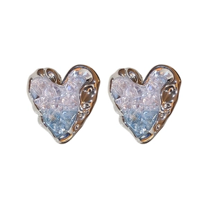 Silver heart stud earrings with liquid metal design and pink blue gradient crystals
