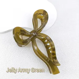 Detail view of army green jelly hair claw clip with strong golden metal spring