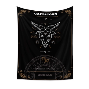 Detail of Capricorn zodiac wall tapestry featuring white goat head and gold geometric lines