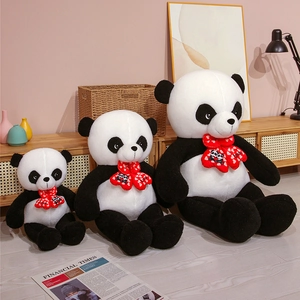 Detailed view of three panda plush shells in different sizes with red heart bows