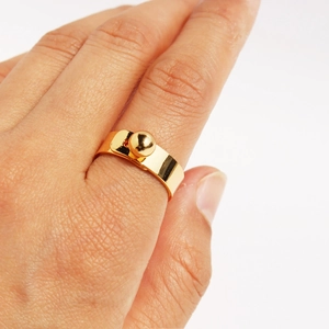 Minimalist gold geometric ball buckle ring for couples with a modern unisex design