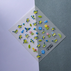 5D embossed nail stickers featuring blue birds and green leaves for floral manicure art