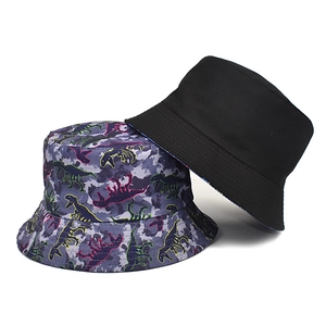 Reversible bucket hat with dinosaur prints and solid black style for sun protection