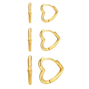 Three-pair set of polished gold heart hoop earrings in small, medium, and large sizes