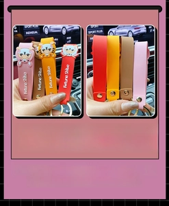 Detail of eco-friendly PVC Fortune Shibe wristlet keychains in multiple colors
