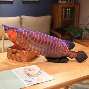 Detail of 3D digital printing texture on realistic golden dragon fish plush pillow