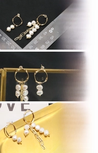 Detailed view of natural freshwater pearl long tassel earrings with 18K gold plating