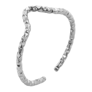 Macro detail of silver irregular wavy ring with hammered texture in minimalist 304 steel