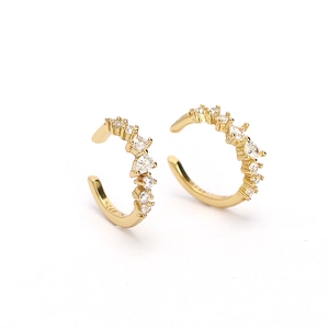 Elegant gold S925 sterling silver ear cuff with sparkling zircon stones in a minimalist style