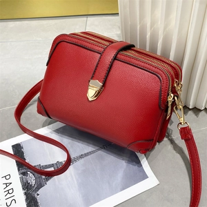 Red multi-layer faux leather crossbody bag with lychee texture and gold metal clasp