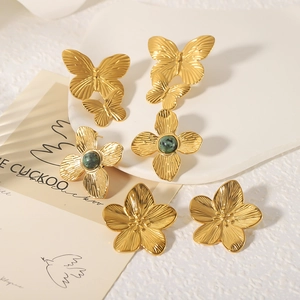Boucles d'oreilles vintage françaises en acier inoxydable doré 18 carats papillon