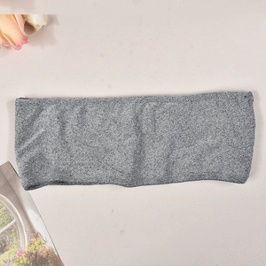 Close-up of grey marl knit stretch fabric texture showing fine ribbed material quality