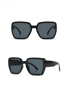 Detailed front and side views of chunky black oversized square fashion sunglasses