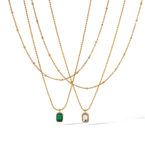 Double-layered 18k gold plated stainless steel necklaces with emerald and clear zircon pendants