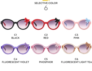 Detailed color selection of bow-knot kids sunglasses in black, red, and glitter shades