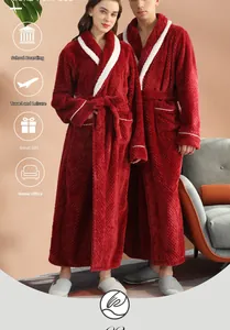 Detail of burgundy thick waffle flannel robe with white contrast collar and soft texture