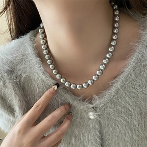 Elegant French vintage grey pearl necklace for women featuring uniform round beads