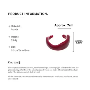 Detailed view of red acrylic cuff bangle with dimensions 5.5cm by 7cm and 33.4g weight