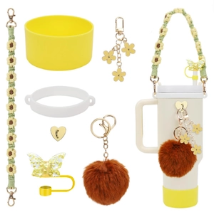 Detail view of yellow cup boot, daisy woven strap, and bow straw cover accessories