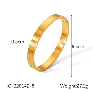 Detail view of 0.8cm wide minimalist gold-plated stainless steel bangle with dimensions