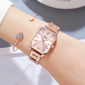 Elegant rose gold rectangular women watch with pink dial and matching heart bracelet