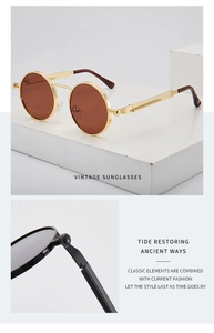 Detail view of vintage steampunk round sunglasses with metal spring hinge and black frame