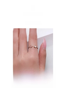 Detail of adjustable S925 sterling silver ring featuring two colorful heart-shaped zircons