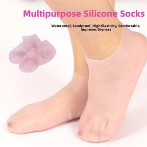 Detailed view of pink silicone moisturizing heel socks for dry skin care and protection