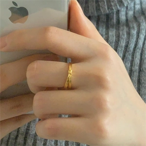 Minimalist 925 sterling silver bow knot open ring with polished gold finish on finger